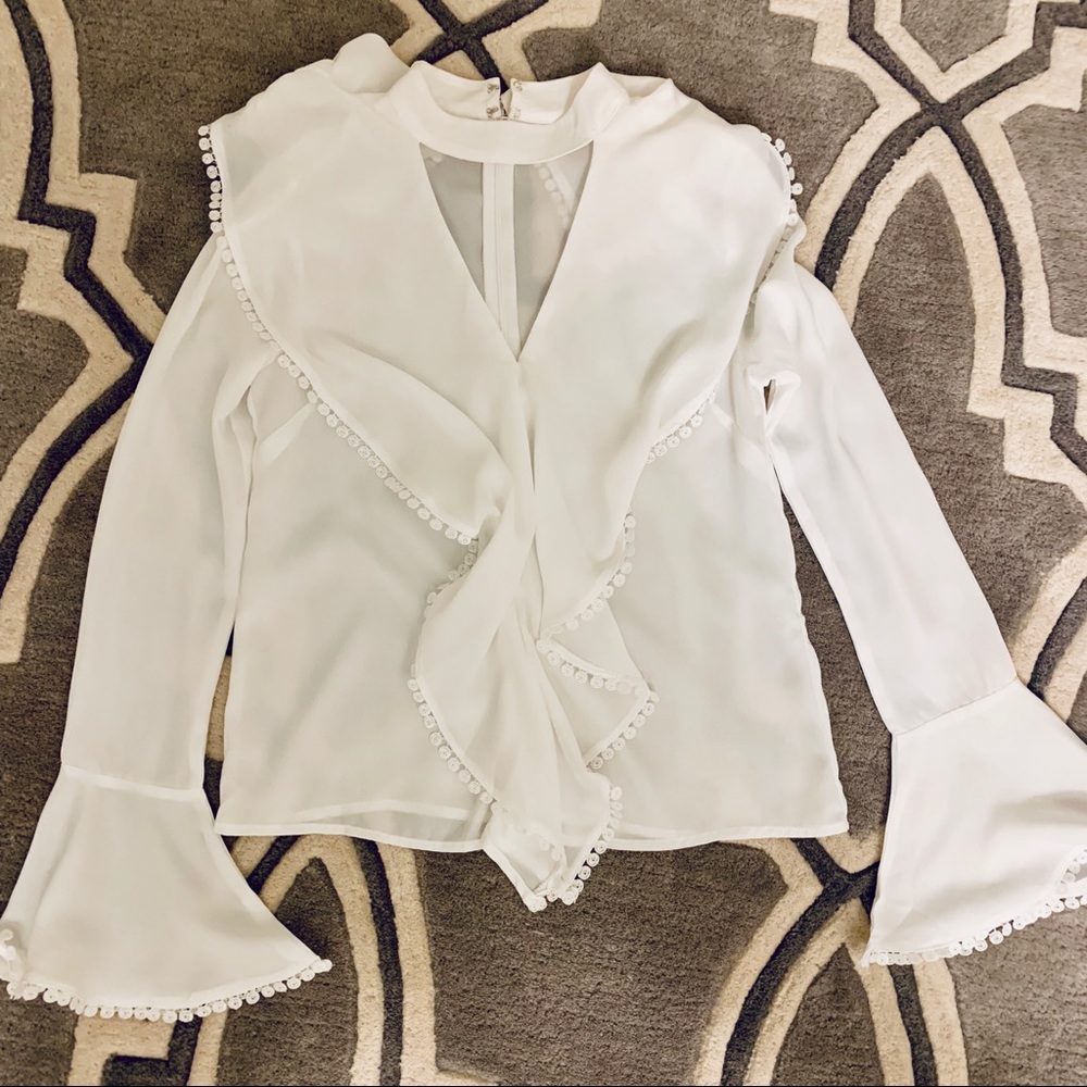 SOLD —White Ruffle Cutout blouse with bell sleeves